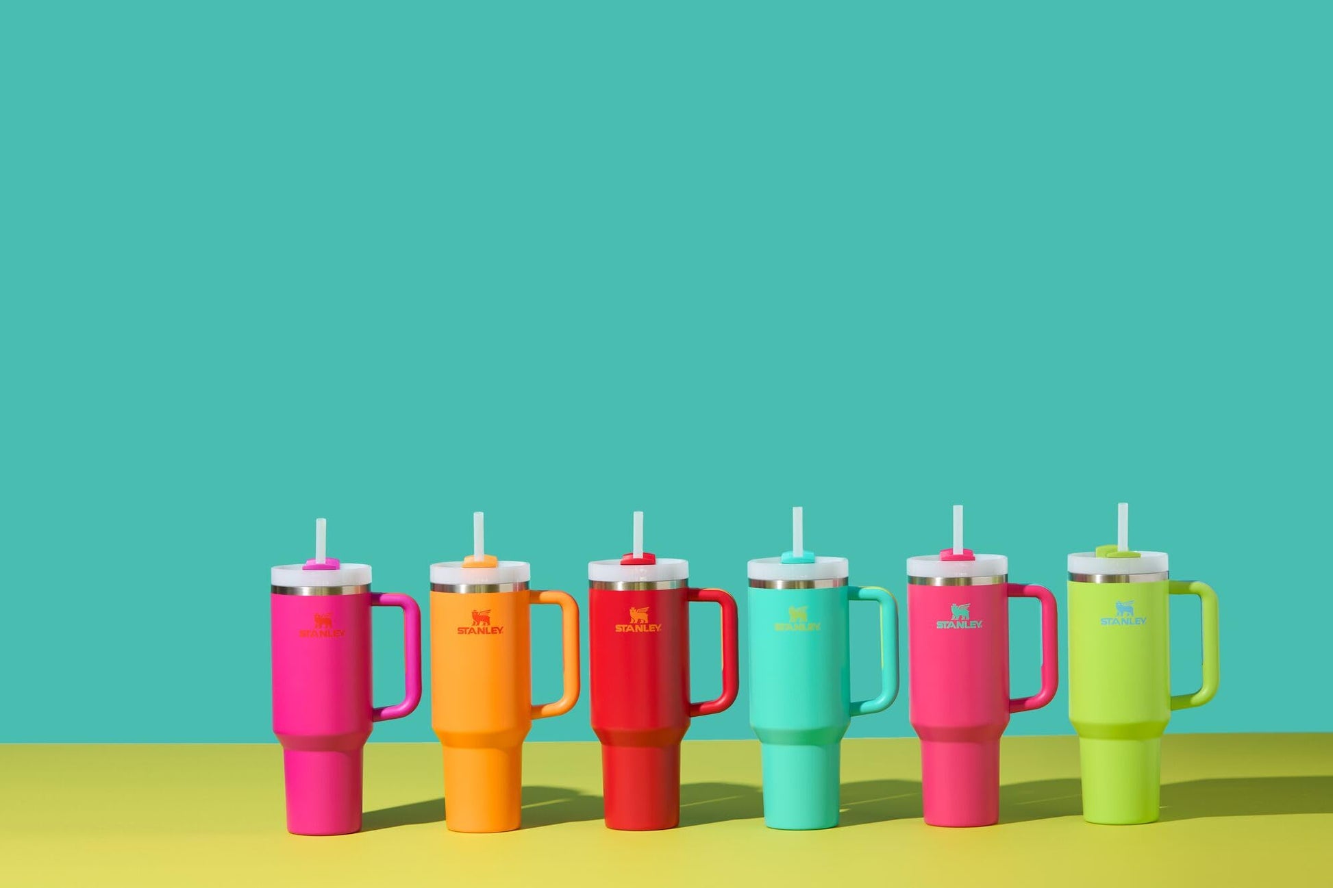 Stanley Quencher H2.0 Tumbler with Handle and Straw 40 oz | Flowstate 3-Position Lid | Cup Holder Compatible for Travel | Insulated Stainless Steel Cup | BPA-Free | Vivid Violet