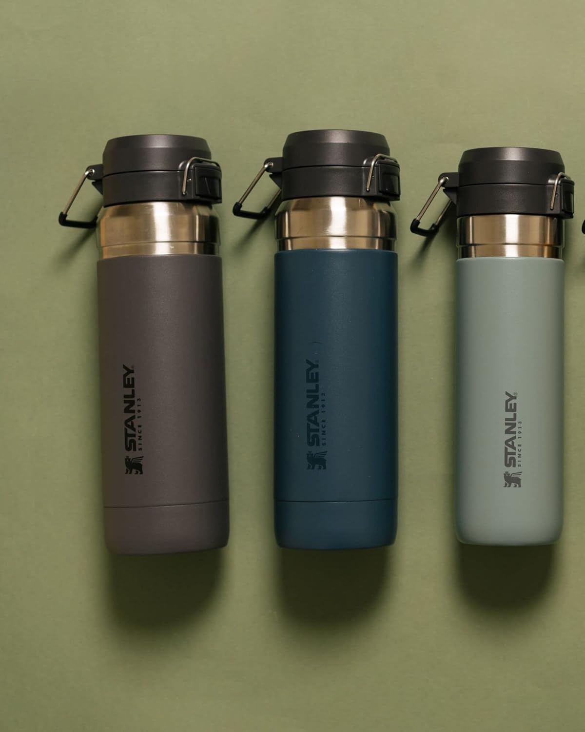 Stanley Quick Flip GO Water Bottle 36 oz | Push Button Lid | Leakproof and Packable for Travel and Sports | Insulated Stainless Steel | BPA-Free | Charcoal