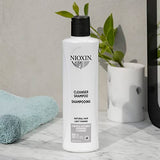 Nioxin System Kit 1, Hair Strengthening & Thickening Treatment, Treats & Hydrates Sensitive or Dry Scalp, Reduces Hair Breakage, For Natural Hair with Light Thinning, Full Size (3 Month Supply)